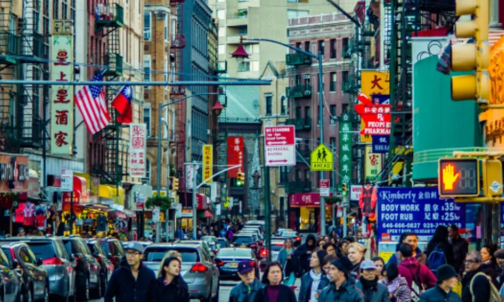 A bustling urban street in Chinatown, New York City-Manhattan Travel Guide Map