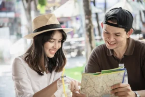 girl and boy planing Budget Travel