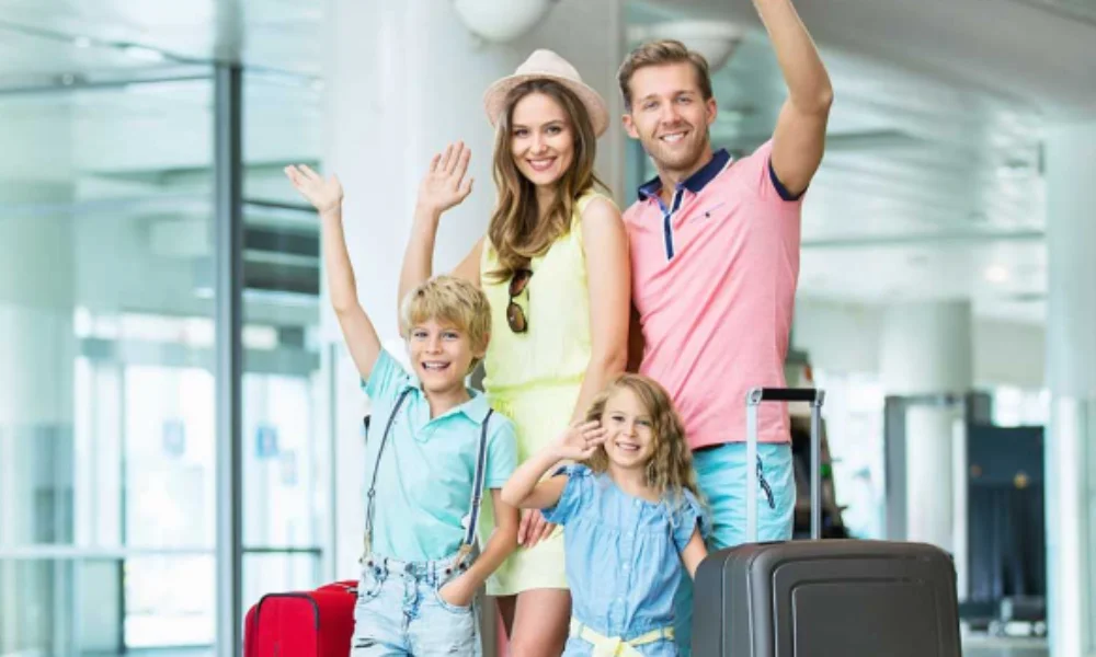 A smiling family of four waves cheerfully at an airport-new york tourist map