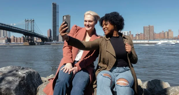 black and white girl setting together