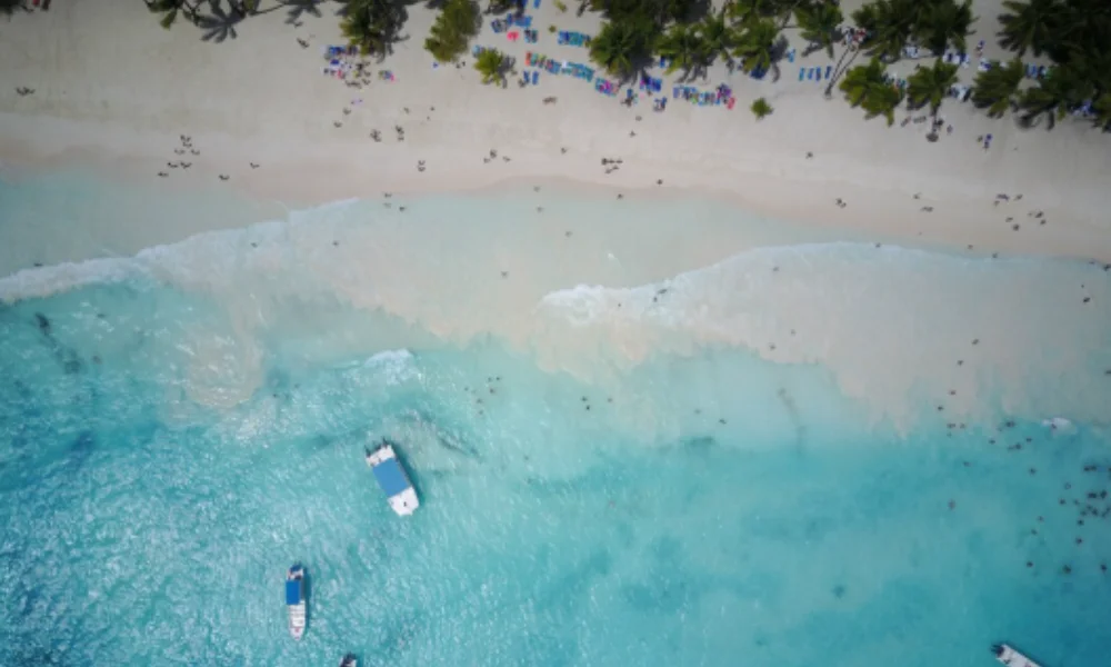 Aerial view of a tropical beach with turquoise water-tropical places to visit