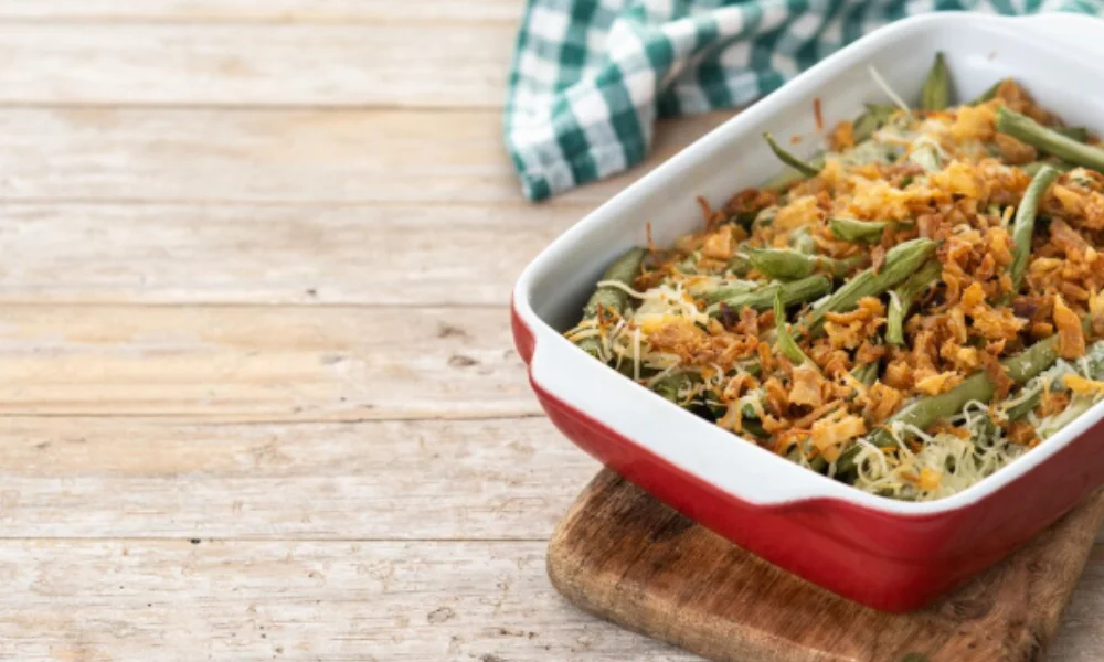 A red baking dish filled with a green bean casserole-easy baked ziti recipe