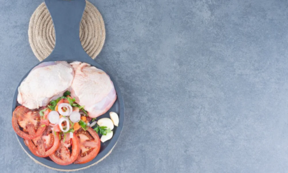 Raw chicken thighs, sliced tomatoes, onions-easy chicken parmesan recipe