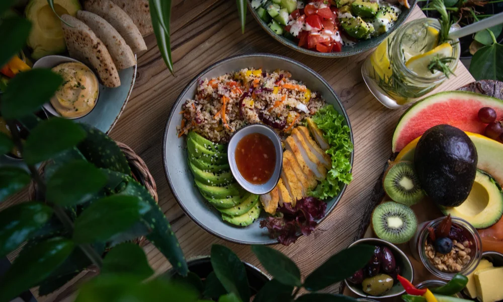 colorful and fresh lunch spread on a wooden table