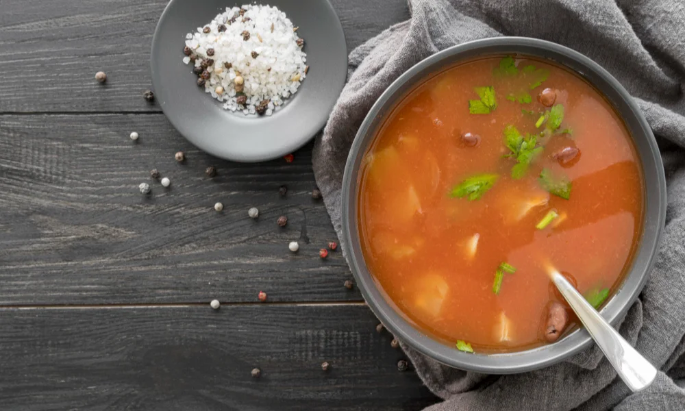 A bowl of tomato soup with beans and herbs-slow cooker soup healthy