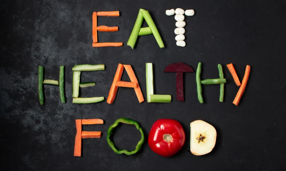 The words "Eat Healthy Food" are creatively arranged