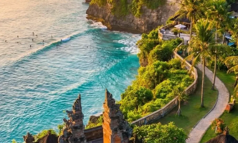Tropical cliffside views and ocean waves in Bali for Best Places to Visit in Spring. 