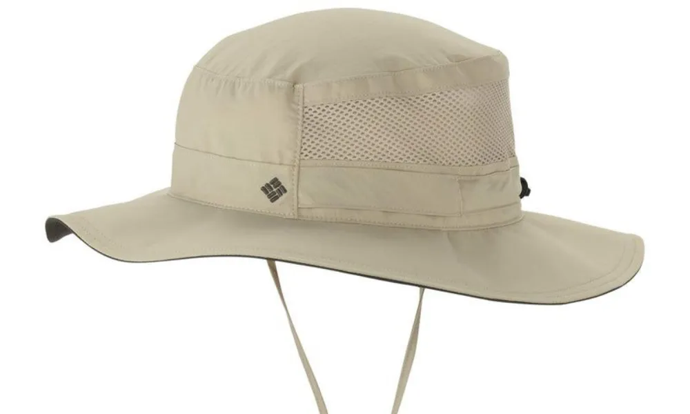 Best Hiking Hats featured in a beige wide-brim boonie style with side mesh ventilation panels and an adjustable chin strap.
