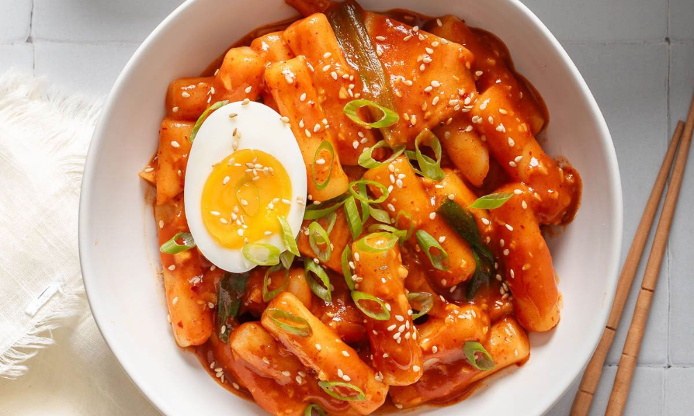 A bowl filled with spicy Korean rice cakes (tteokbokki)-Korean Food Recipes