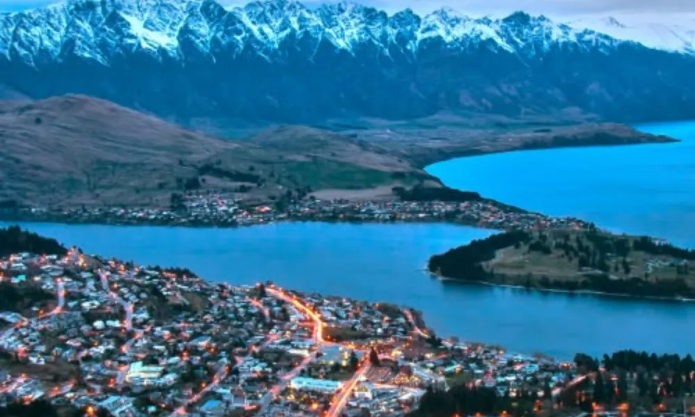 Scenic mountain and lake town landscape in Queenstown for Best Places to Visit in New Zealand.