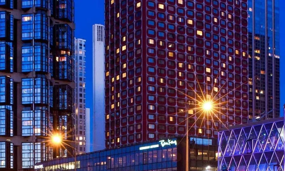 Exterior night view of Novotel Paris high-rise hotel for Best Hotels in Paris.