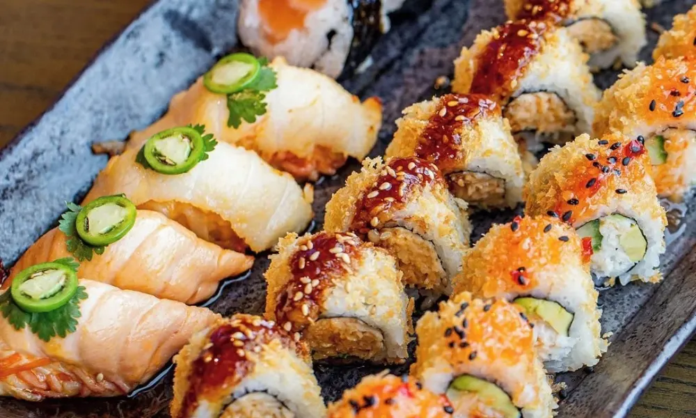 Assorted gourmet sushi rolls and nigiri presented on a platter for best restaurants in Seneca.