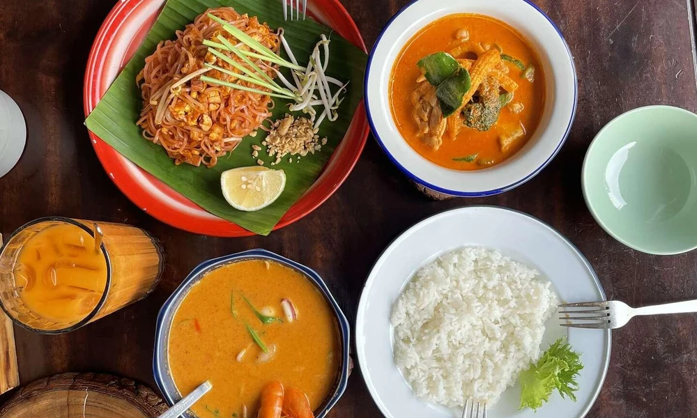 Affordable Thai lunch with noodles and curry